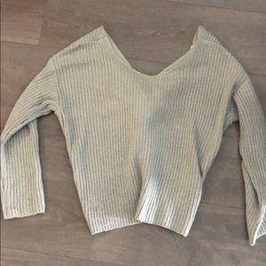 Grey sweater with knotted back